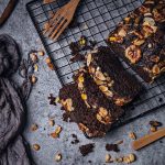 chocolate loaf cut into slices on a cooling rack