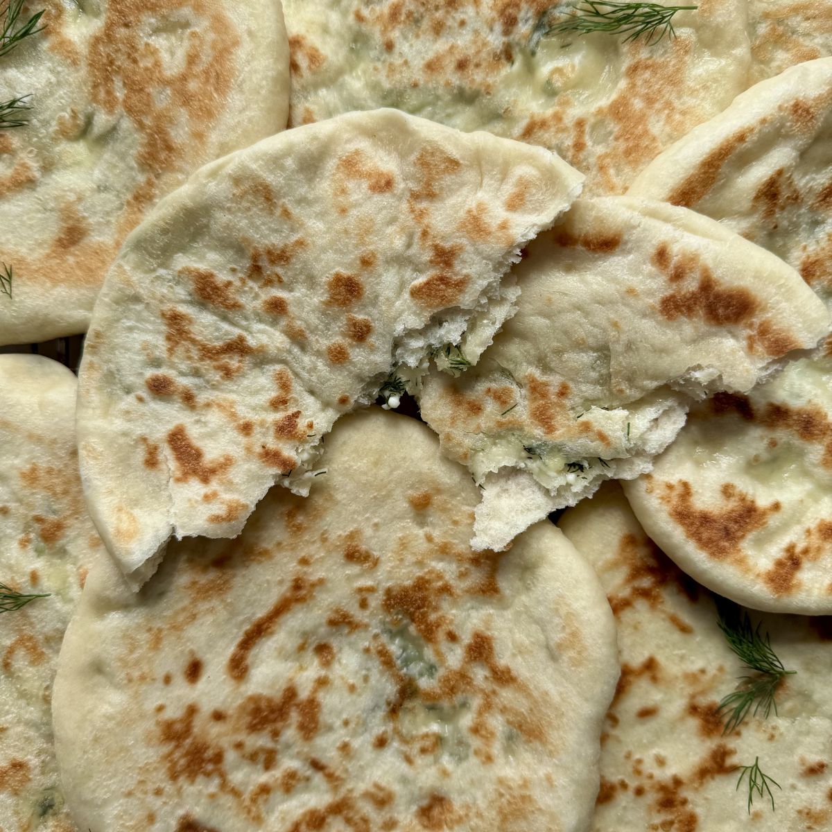 greek pitas cut in half.