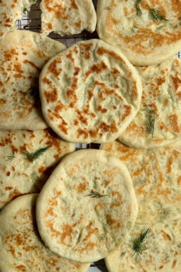 greek pitas on a tray.