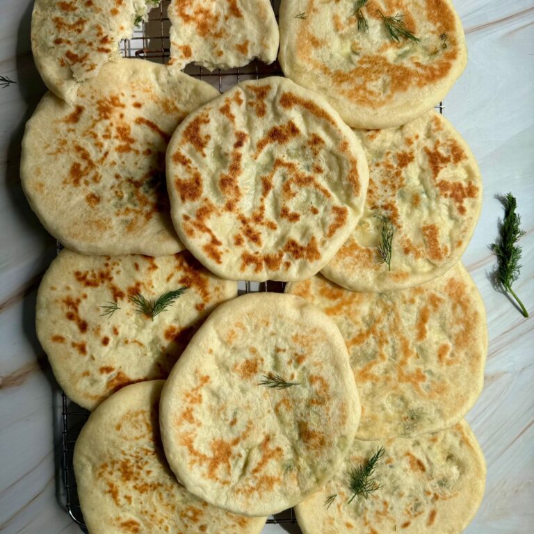 greek pitas on a tray.