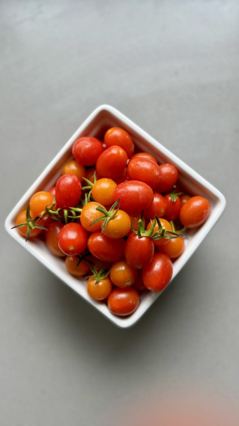 cherry tomatoes in a white container