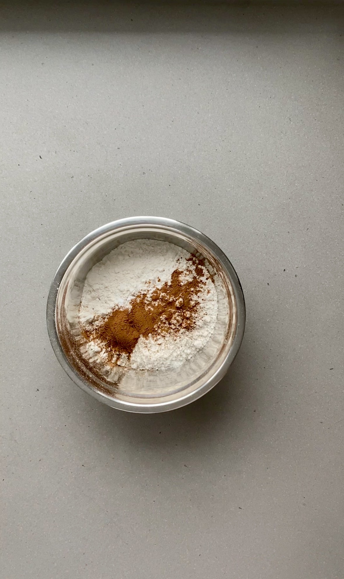 dry ingredients like flour and spiced in a small bowl.