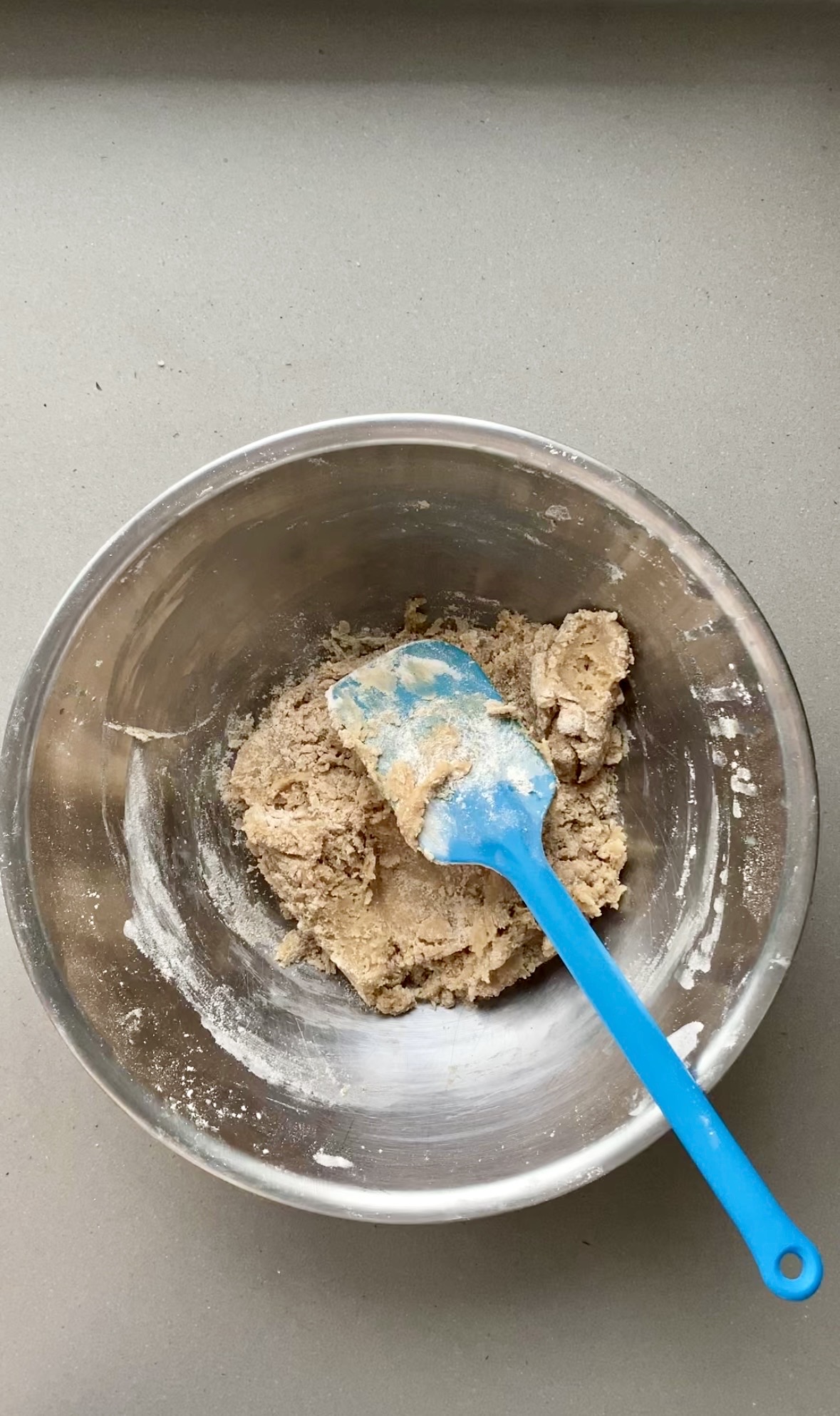 wet ingredients mixed with dry ingredients in a large bowl.