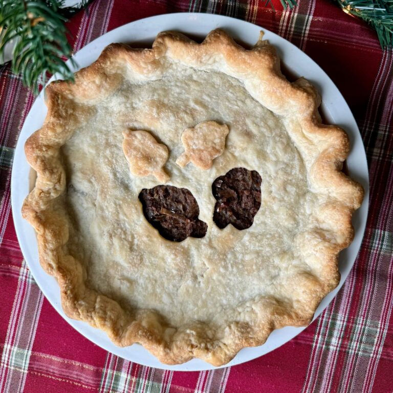 vegan meat pie on red tablecloth