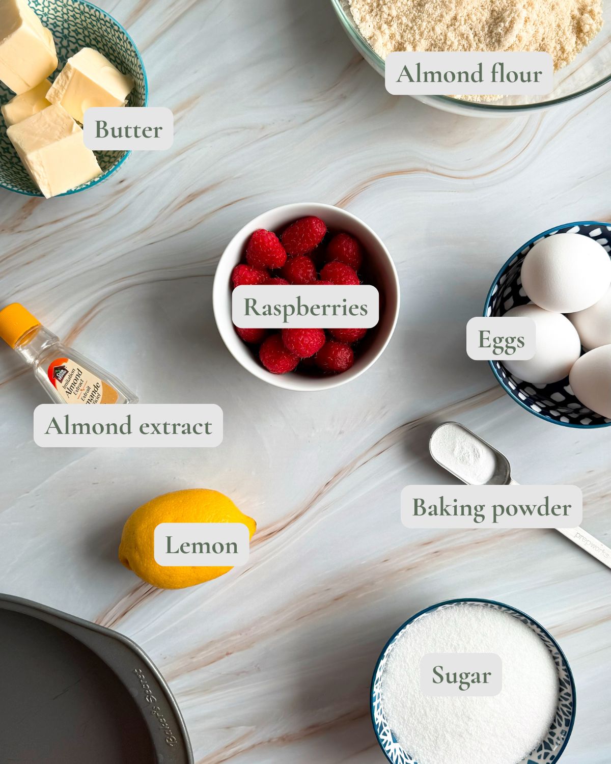labelled ingredients for almond raspberry cake.