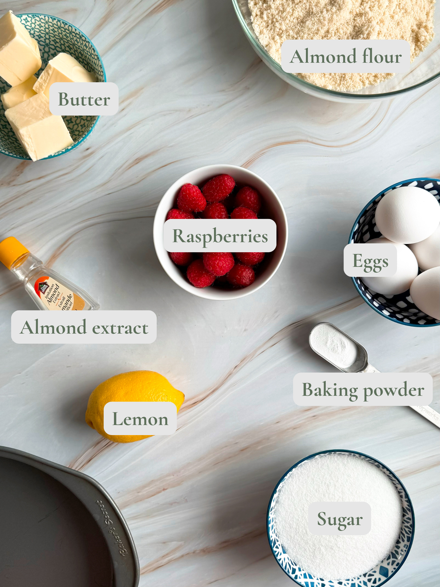 labelled ingredients for almond raspberry cake.