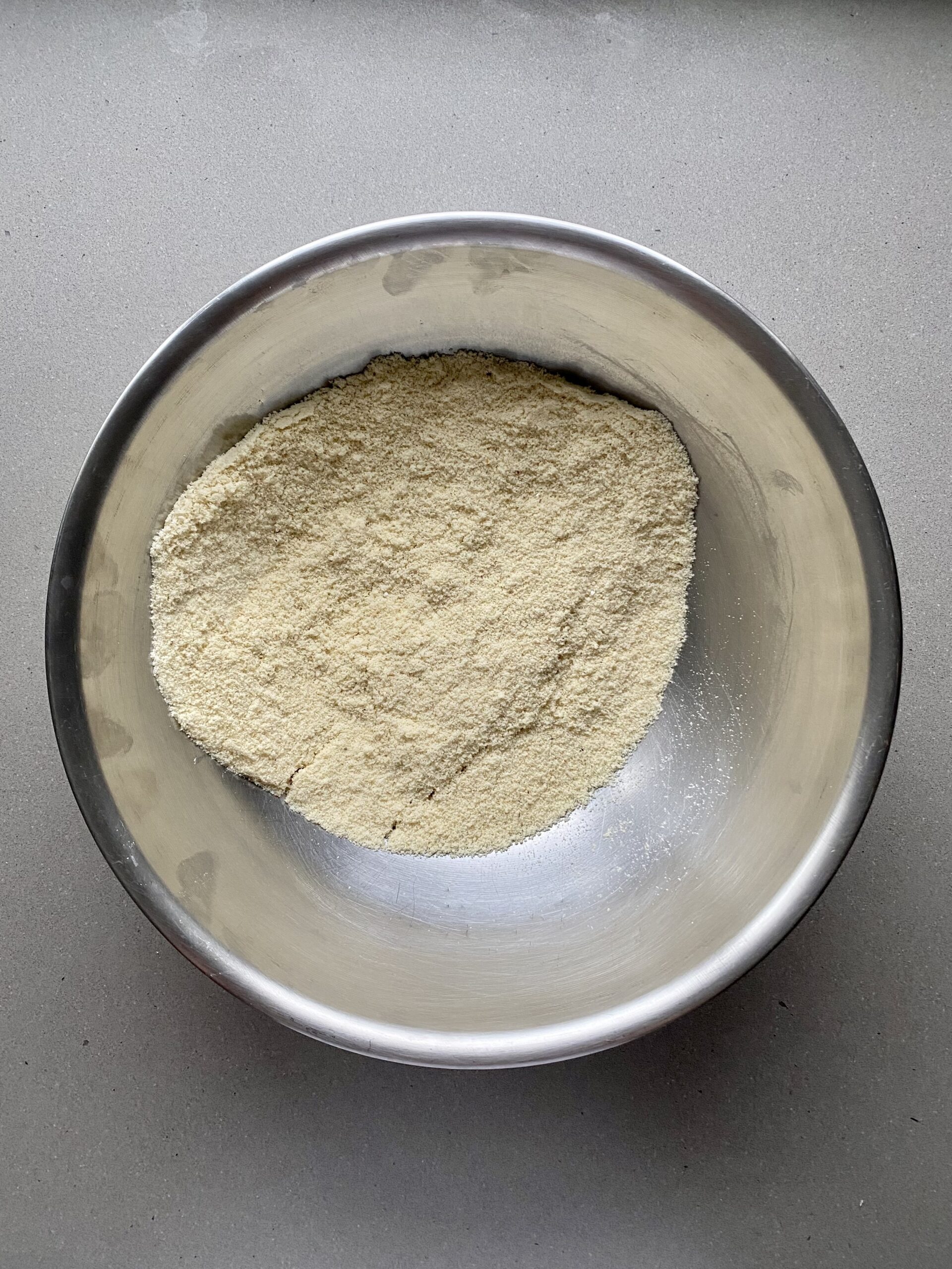 almond flour and other dry ingredients in a mixing bowl.