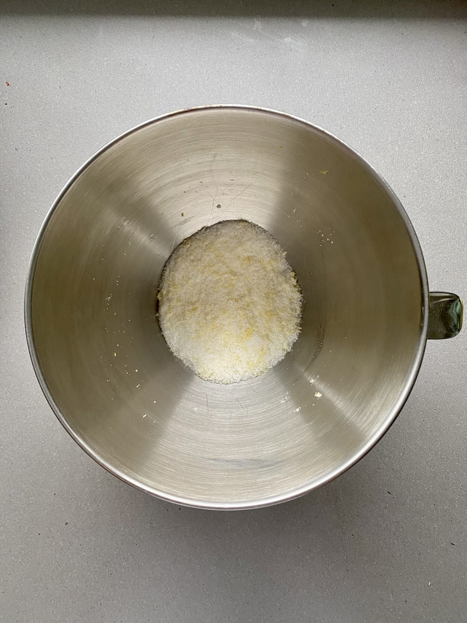 sugar and lemon zest in a large bowl.