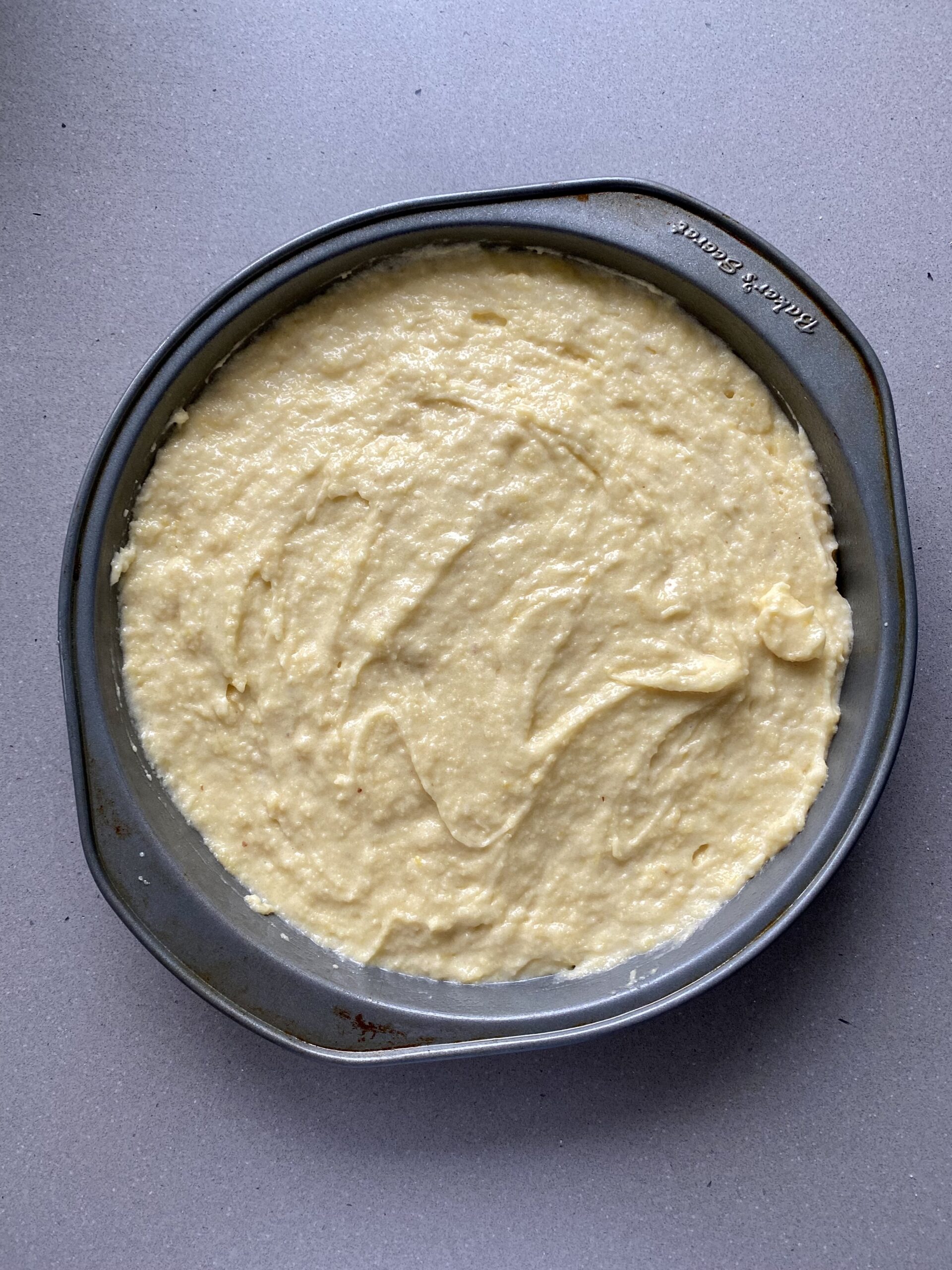 cake batter in cake pan before baking.