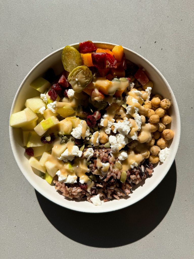 fall harvest bowl with maple tahini dressing