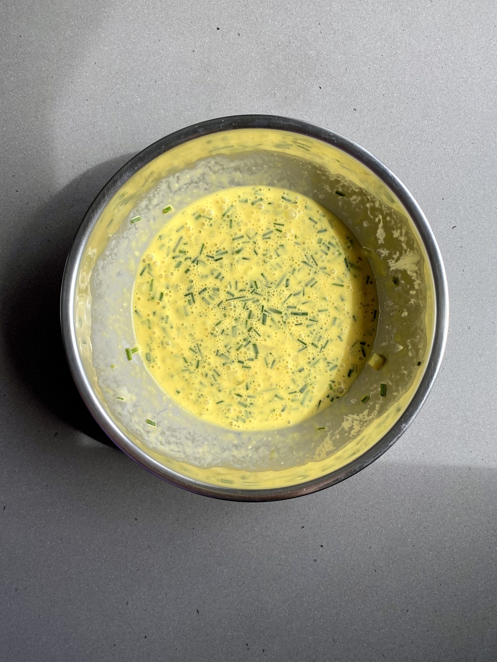 egg mixture whisked in a small bowl.