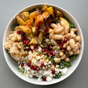 winter bulgar salad in a white bowl