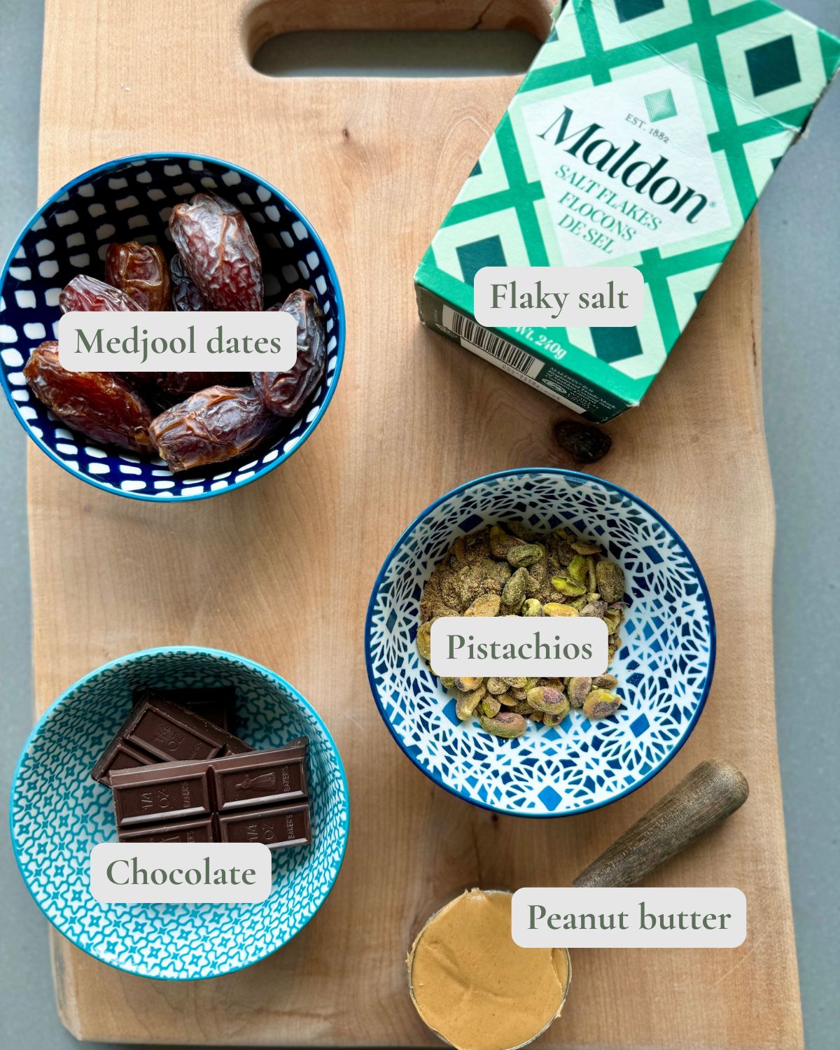 peanut butter date balls labelled ingredients.