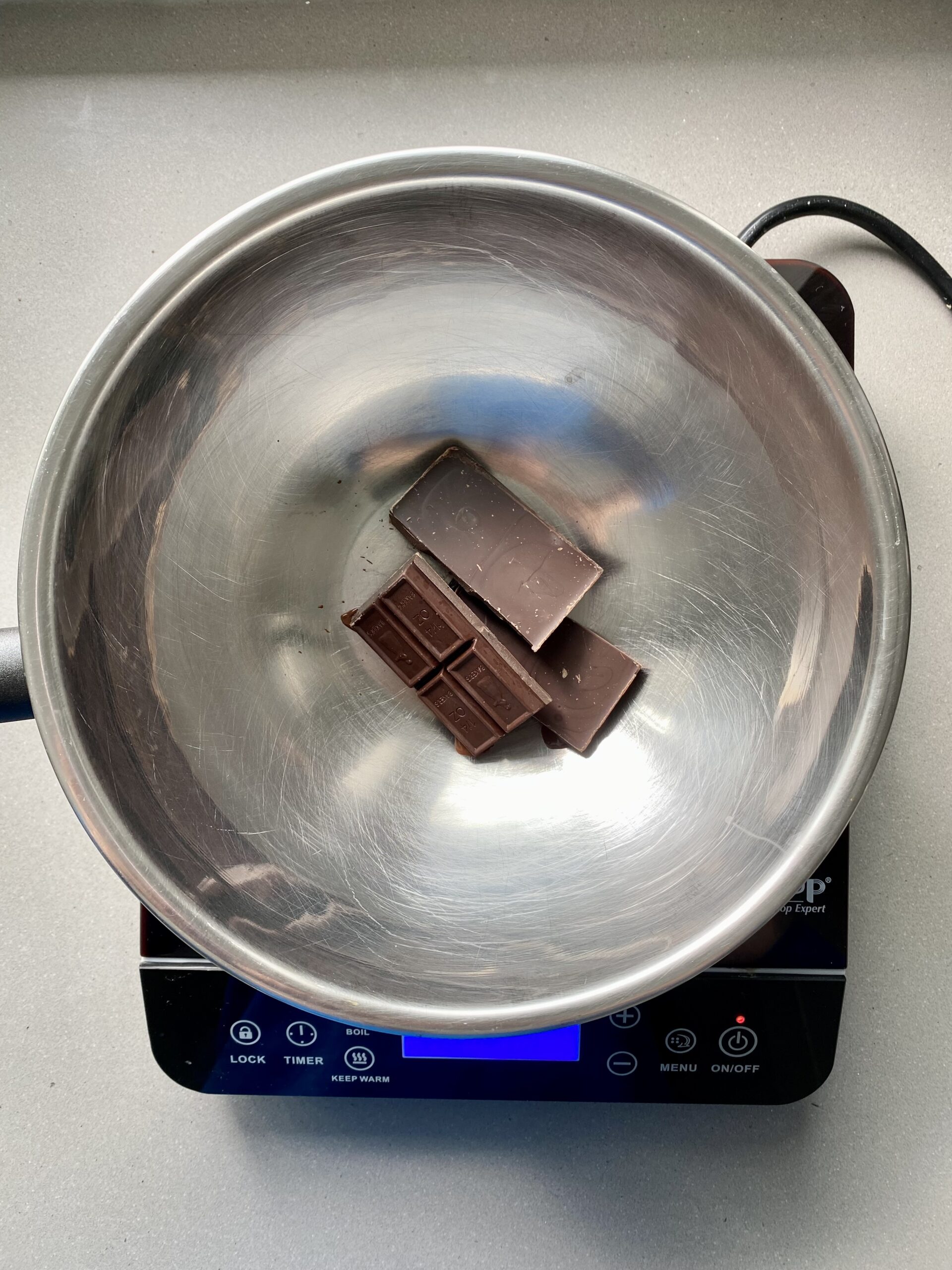 chocolate in a small bowl over a double boiler.