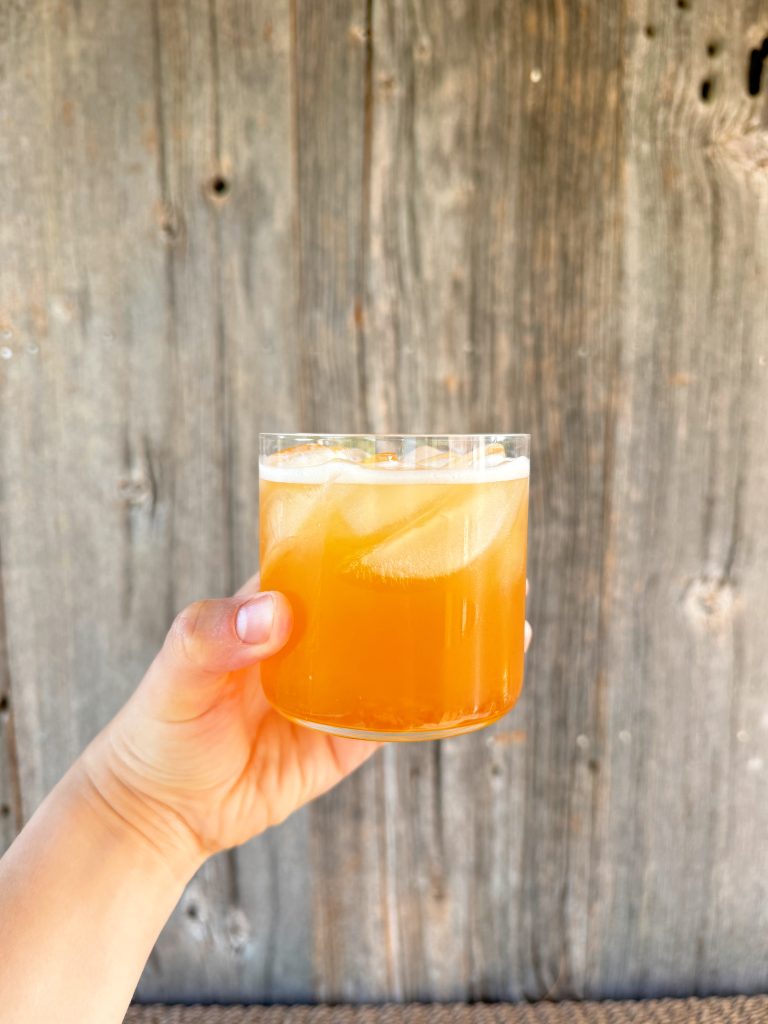 grapefruit radler recipe in a glass with ice