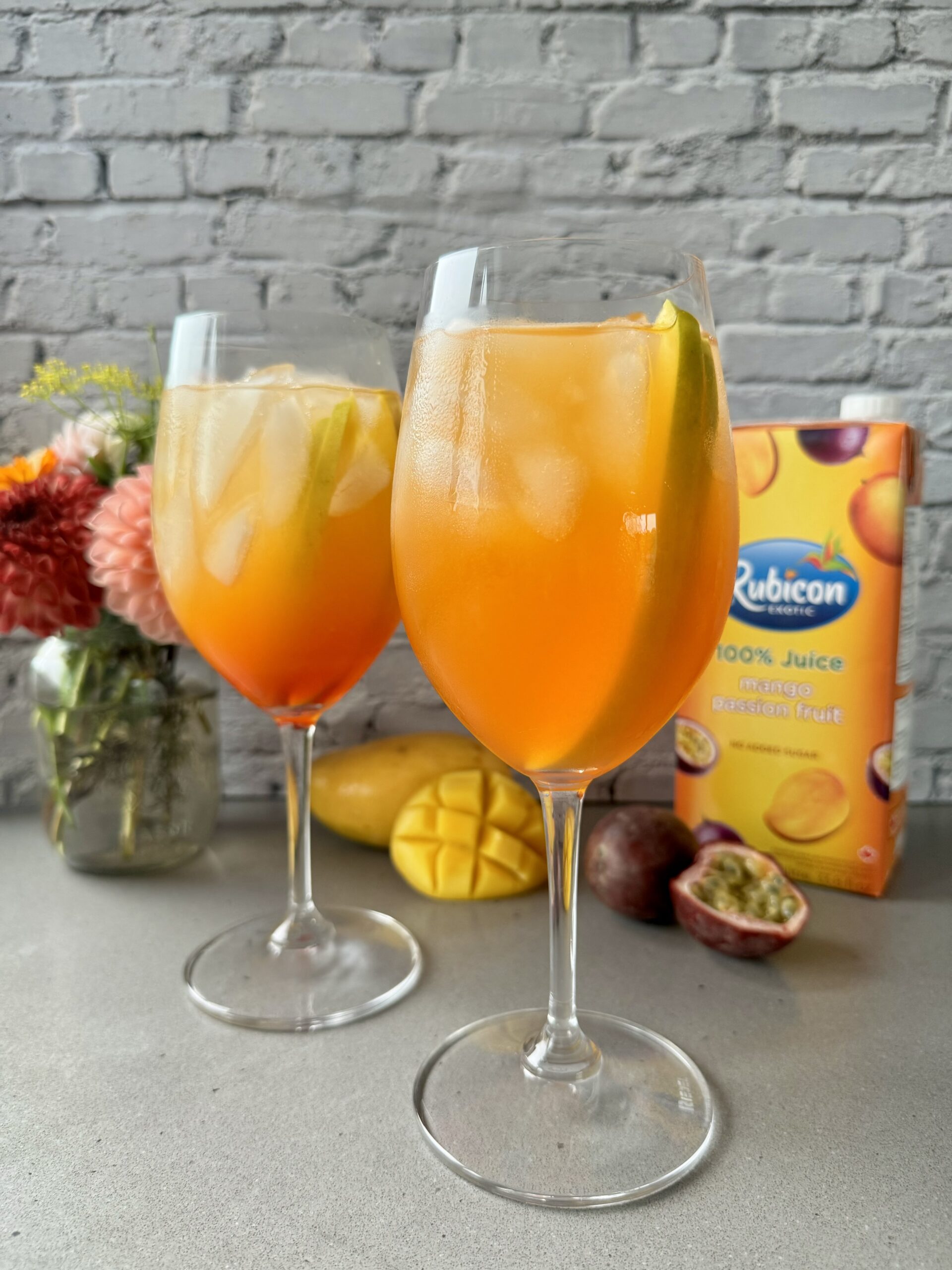 Rubicon final drink mango passionfruit spritz in wine glasses