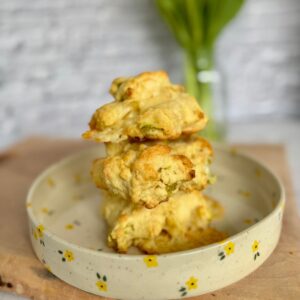 cheese drop biscuits on flower plate.
